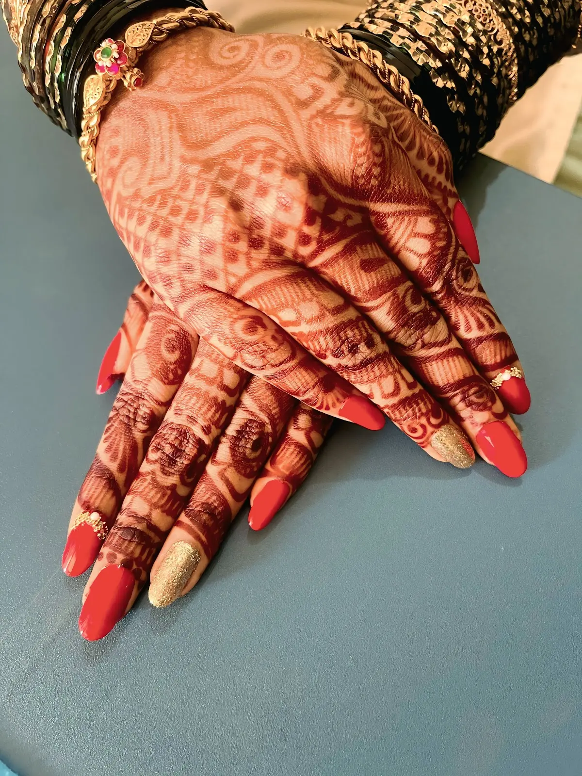 Bridal mehendi covering the backs of both hands